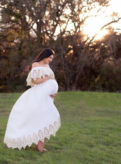 Eyelet lace off-the-shoulder dress, photographed outdoors at golden hour