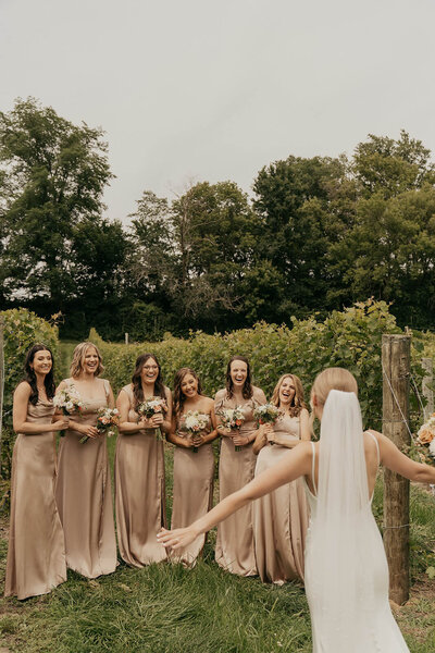 Bride's first look with her bridesmaids