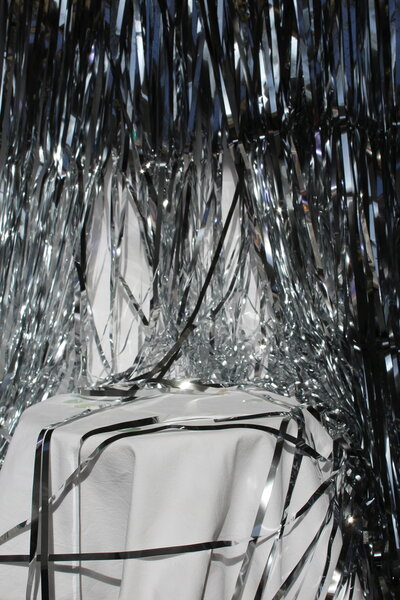 Silver tinsel editorial-style set – retro meets digital