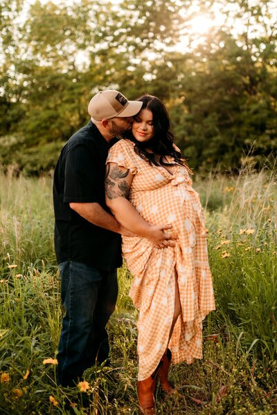 fall maternity photo of couple
