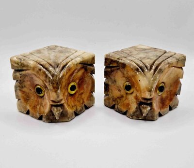 Pair of vintage carved stone owl bookends with yellow eyes, unique home décor accents