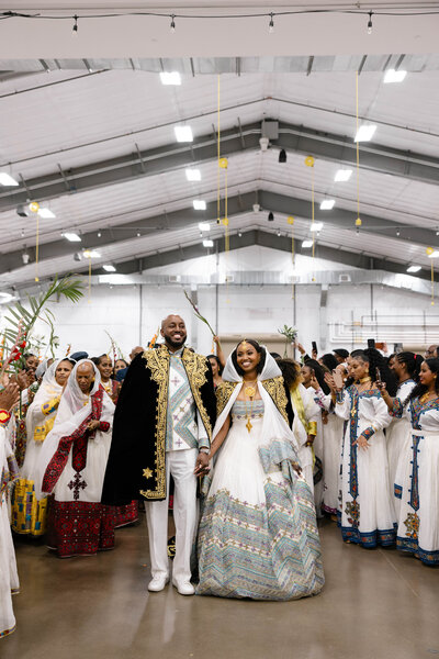 flash wedding photography of the bride and groom on a couch together