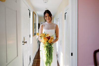 Bridal portrait with yellow and green bright beautiful florals