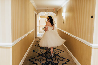 bride walking through hotel