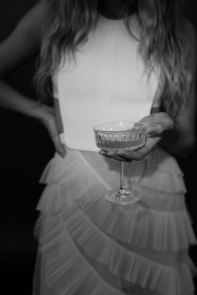 bride holding champagne
