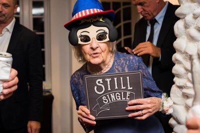 Wedding photobooth "still single" sign