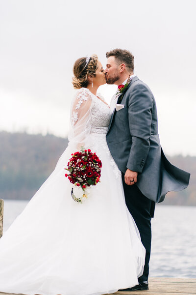 Bride and groom at Miller Ground on Lake Windermere in the Lake District taken by wedding photographer Anthony Horseman