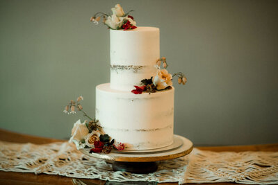 two tier custom cake with minimal florals