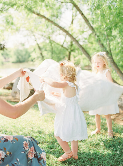 Toddler stands barefoot during his lifestyle portrait session by Grace Paul Photography