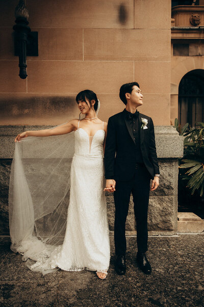 Joyful brand portrait by Brisbane photographer showing confidence and movement with woman shaking her hair