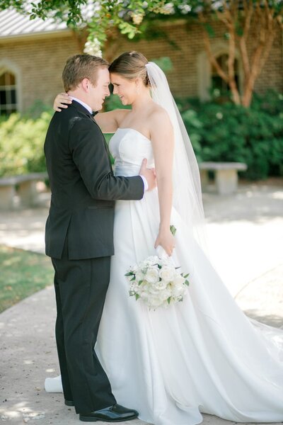 Bride and groom hugging