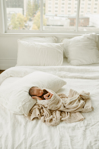 baby on bed