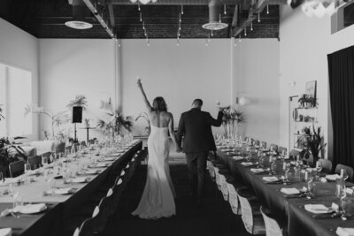 The bride pouring champagne for a guest on the dance floor, documented by Photo TM (T+m Photo), a Sacramento professional photographer offering boudoir photographers near me and event photography packages.