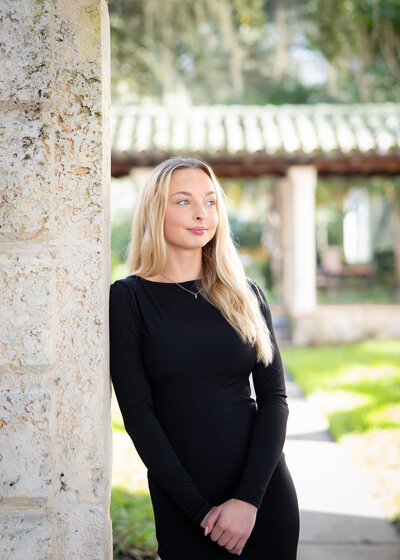 Senior photo shoot of blonde beauty at Rollins College in Winter Park Florida
