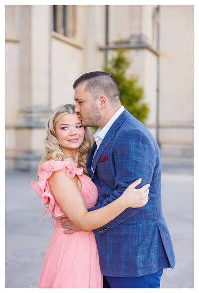 engaged couple posing in front of Biltmore Estate in Asheville, North Carolina photographed by Asheville Engagement Photographer