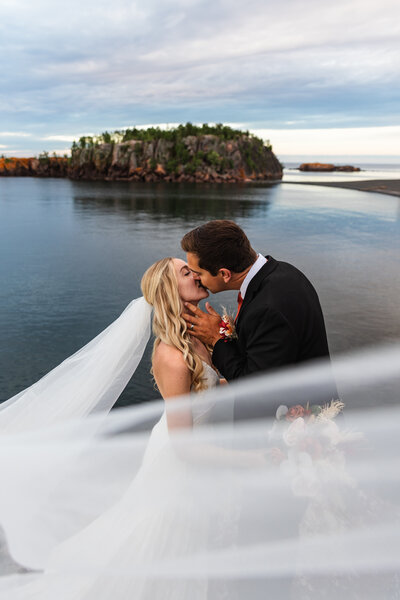 couple kissing in Minnesota taken by Minnesota elopement photographer Marcus Hanenburg Photography
