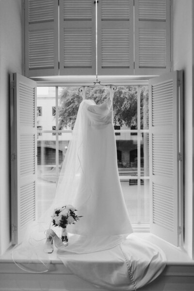 timeless bridal gown in historic church window