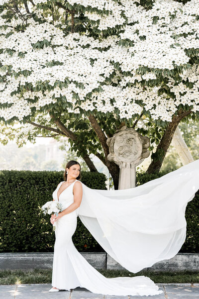 bride with veil flowing in the wind at the Cleveland art museum