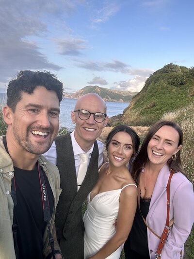 Amy & Nick posing with couple