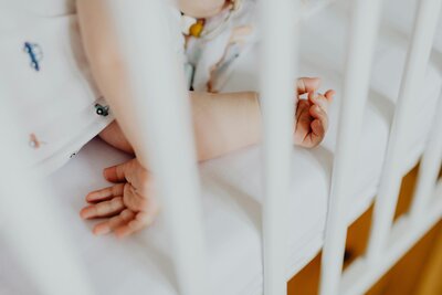 baby sleeping in crib by themselves