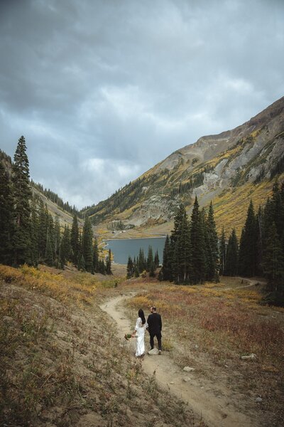 A sweet couple elopes in the mountains of Colorado and sunset.