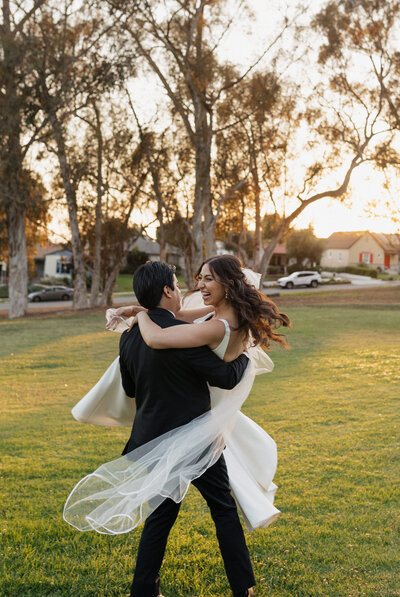 Bride and Groom under wedding veil