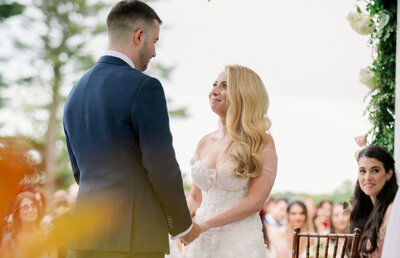 Bride and Groom sharing a hearty laugh during bridal party photos