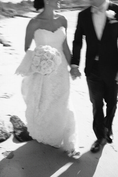 Bride and groom walk up memorial steps at their DC wedding