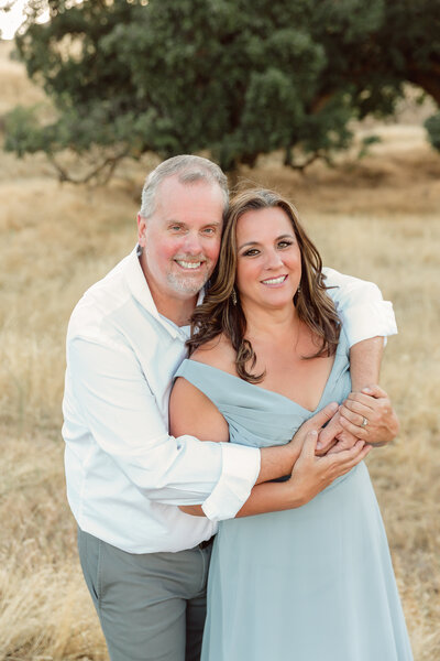 portrait of a couple in the foothills