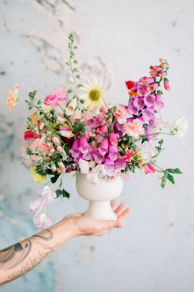 Colorful floral arrangement for at Scottsdale wedding venue designed by Snapdragon Bloom Bar florist and wedding planner