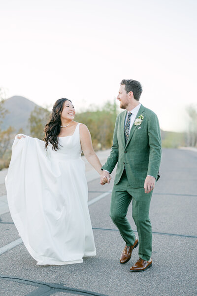 The bride and groom gracefully exit the wedding ceremony, hand in hand, embarking on their journey together