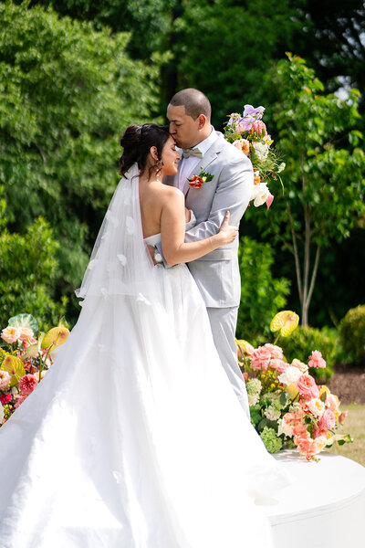 Elegant Reception with vibrant florals, elevated event rentals. 