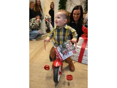 boy receiving a new scooter