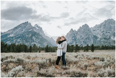 Lake Tahoe Elopement Photographer captures man and woman kissing during adventure engagement photos