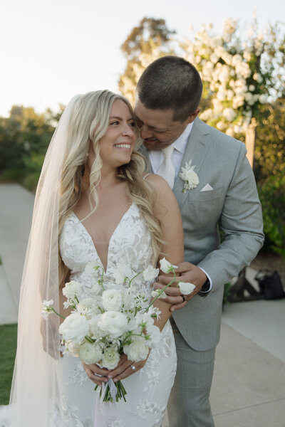 couple hugging  during bride and groom portraits