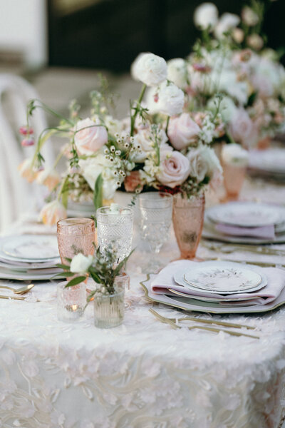Wedding details of a tablescape at a beautiful summer wedding.