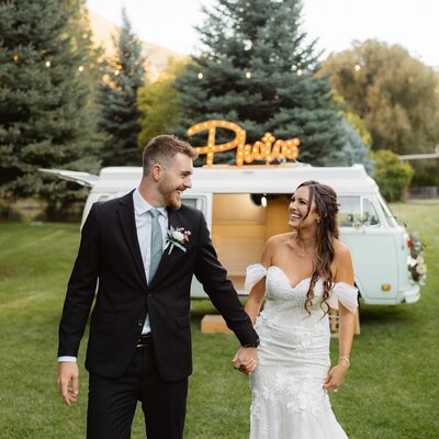 Utah Wedding Photographer captures man and woman laughing after mountain wedding 