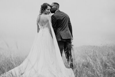 black and white couple sharing kiss at adventure elopement in colorado
