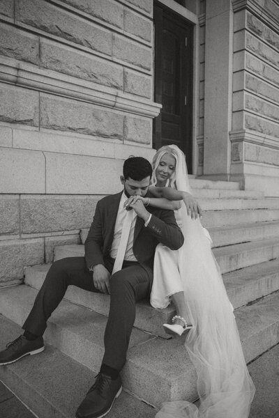 man embracing woman from behind