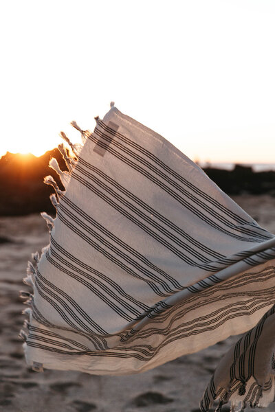 towel-blowing-in-wind-sunset