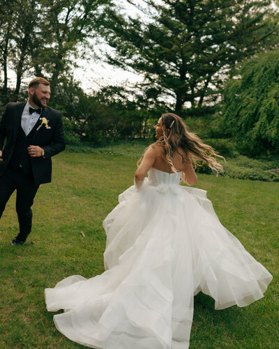 bride and groom running chasing eachother