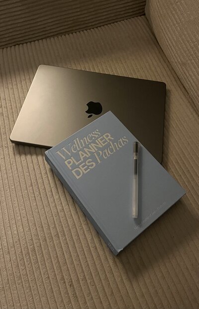 Close-up of a seated woman meditating beside healing crystals and burning incense, symbolizing spiritual connection, energy cleansing, and holistic wellness.