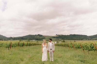 Couple Posing in Vineyard - Marilee & Andrew | At the Joy Salem Oregon Wedding