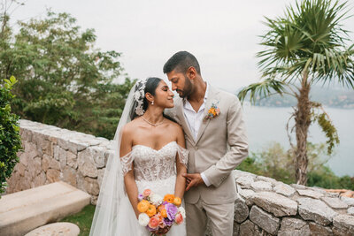 Bride and groom sharing an intimate moment at Casa Angelina in Zihuatanejo, Mexico.