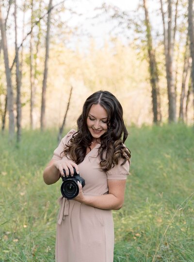 Jennifer holding camera