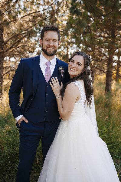 Happy Bride and Groom close together after Wedding Mass