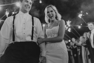 bride and groom facing away