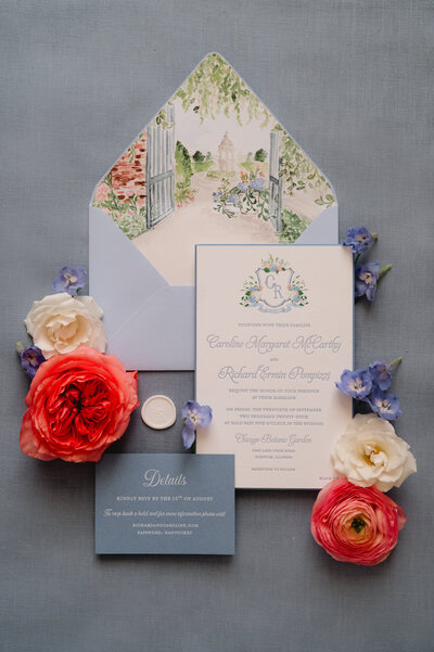 Elegant wedding invitation suite with floral designs and pastel accents.