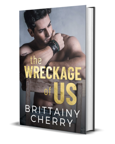 man with beard wearing a white shirt looks down on the cover of the air he breathes by romance author brittainy cherry
