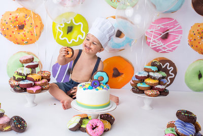 Boy eating donuts